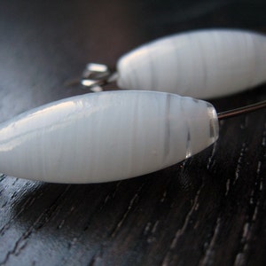 Sleek white and clear glass earrings image 2
