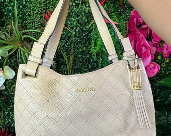 Calvin Klein Beige Cream Color Bag Purse with Double Straps Quilted Design, Magnetic Closure, Tassle