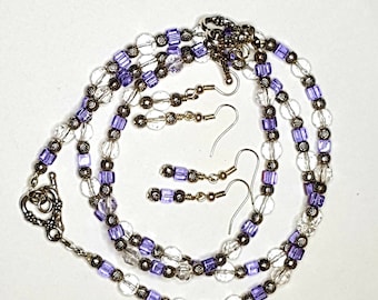 Lavendel und transparente Kristallohrring-Halsketten- und Armbandset