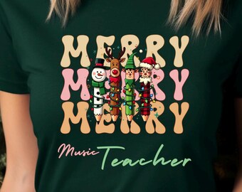 Christmas Music Merry Teacher Tshirt is the gift for golden Music Teacher, party outfit, holiday photos, and Christmas pjs