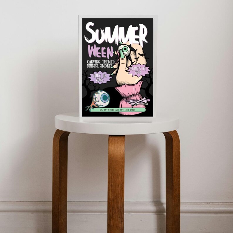 May include: A black and white poster with the text "Summer Ween" in white letters. The poster advertises a party with carving, themed drinks, and s'mores. The party starts at 7pm on July 10, 2023. The poster features a hand holding a pink bag with a large eye and bones.