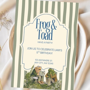 May include: A rectangular birthday invitation card featuring vertical sage green and cream stripes. The center displays a blue-bordered frame with the text Frog & Toad HAVE A PARTY! JOIN US TO CELEBRATE LIAM'S 5TH BIRTHDAY! 123 ANYWHERE ST. ANY CITY, AW 12345.