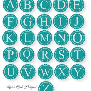 May include: Scallop Alphabet 1, a set of 26 teal blue scalloped circles with white letters, A through Z, in a white font.