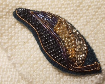 Brooch shawl hat pin Beaded. Large beaded leaf, Black, gold, silver, green and purple bead with gold wire. Handmade. Support small business.