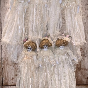 Small creepy scary horror dolls