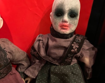 Creepy crackle doll