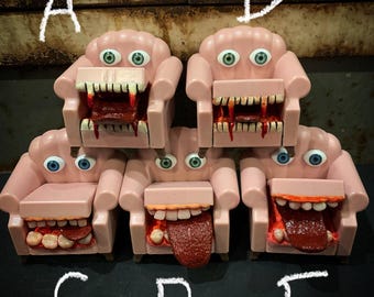 Plastic pink chair with mouth and eyes