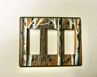 Triple Rocker/GFI.    Rocker/GFI wall plate birch tree design