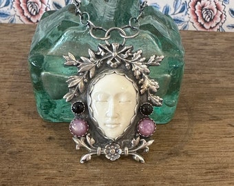 NATURE GODDESS Artisan Handmade Sterling Silver and Gemstone Necklace Featuring Carved Bone Goddess Face Silver Wreath and Pink Sapphires