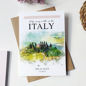 May include: A watercolour illustration of a Tuscan landscape with a house and rolling hills. The text "TRAVEL GUIDE" is at the top of the card, and the text "Fly away with us to ITALY" is below it. The text "JOE & ALEX 21.09.24" is at the bottom of the card.