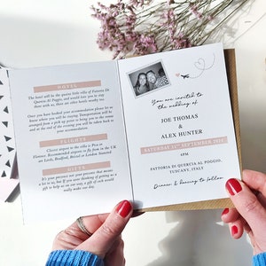 May include: A wedding invitation with a pink and white design. The invitation features a photo of the couple, a plane, and the text "You are invited to the wedding of Joe Thomas & Alex Hunter, Saturday 21st September 2024, 4pm, Fattoria di Quercia al Poggio, Tuscany, Italy, Dinner & Dancing to follow."