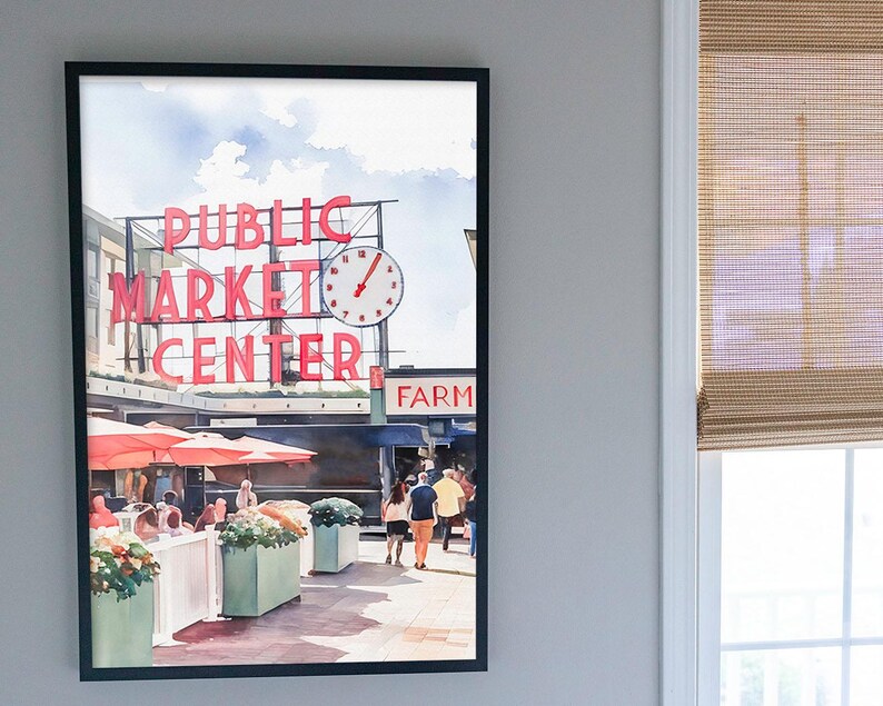 Callaghan Collective Watercolor Painting of Pike Place Market in Seattle Washington featuring the Public Market Center sign, red umbrellas, and the Farmers Market crowd, Pacific Northwest wall art for apartment or office decor.