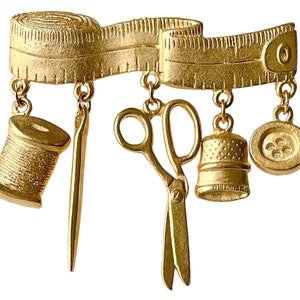 1980s Made in USA Satin Gold Plate Seamstress Sewing Vintage Dangling Thread Button Tape Measure Needle Scissors Figural Charms Brooch Pin