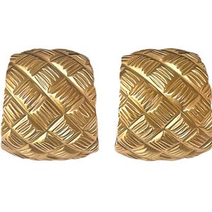 May include: A pair of gold hoop earrings with a textured, woven design.