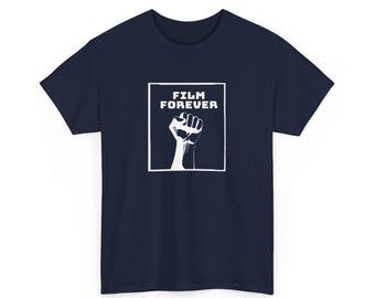 May include: Navy blue t-shirt with a white graphic of a raised fist inside a white square, with the words "FILM FOREVER" above it. The design is centered on the front of the shirt.