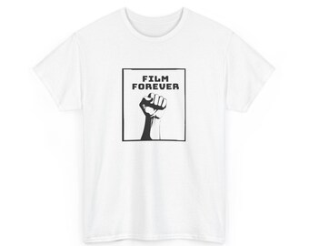 May include: White t-shirt featuring a black and white graphic of a raised fist inside a black square. The words "FILM FOREVER" are printed above the fist in a bold, sans-serif font. The shirt is made of a soft material.