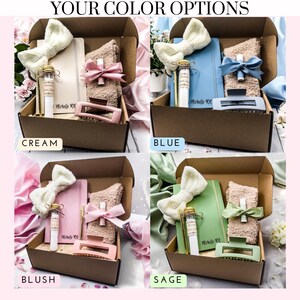 May include: Four gift boxes with different color themes: cream, blue, blush, and sage. Each box contains a notebook, a headband, a fluffy sock, a small bottle, and a hair clip. The notebook has the text "Michelle RM" on the cover.