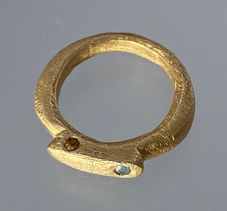 Bronze Ring with Scattered Gems.