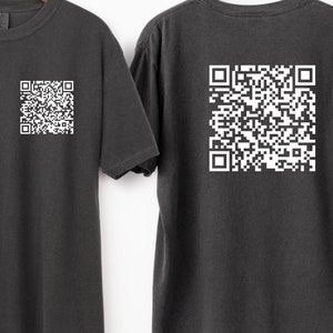May include: A dark gray t-shirt with a white QR code printed on the front left chest and another white QR code printed on the back.