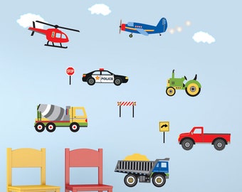 May include: A set of colorful vehicle wall decals for kids' rooms. The decals include a red helicopter, a blue airplane, a black and white police car, a green tractor, a gray cement mixer, a red pickup truck, a blue dump truck, and a stop sign.