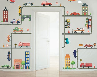 May include: A set of colorful city-themed wall decals featuring vehicles, buildings, and road signs. The decals are designed to be applied to a wall, creating a fun and engaging scene for a child's room.