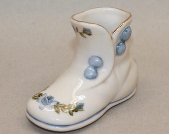 Botita de bebé estilo vintage azul esmaltado