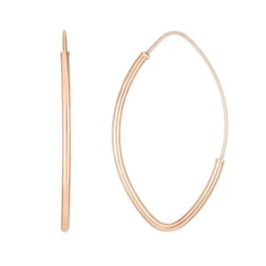 May include: A pair of rose gold hoop earrings with a slightly oval shape.