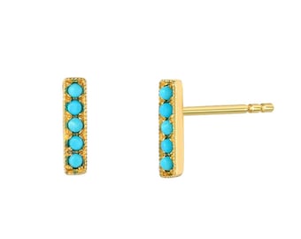 May include: Gold bar earrings with turquoise stones.