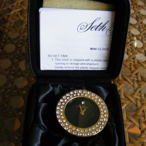 Seth Thomas Mini Clock, Face Black, Surrounded by Two Rows of Crystals, With Case and Instructions
