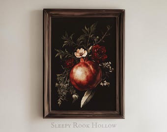 May include: A framed print of a still life featuring a red pomegranate with white and red flowers on a dark background.