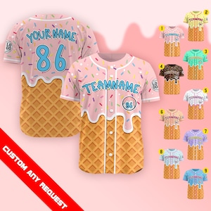 May include: Pink baseball jersey with a waffle cone design. The jersey has a sprinkle pattern and the text "YOUR NAME" and "86". Additional jerseys in various colors are displayed, each with a waffle cone design and the text "TEAMNAME".