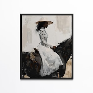 May include: A framed art print depicts a person riding a black horse. The person is wearing a long white dress and a wide-brimmed hat. The artwork has a painterly style with a neutral color palette, featuring shades of white, black, and beige.
