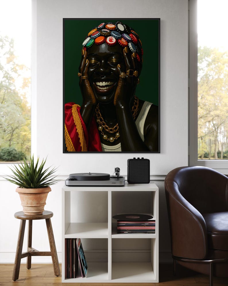 May include: A framed portrait of a person with dark skin, adorned with bottle caps on their head and gold jewelry. The person is smiling with hands on their face. The background is a dark green.