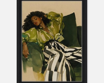 May include: A framed art print featuring a person in a relaxed pose on a green sofa. The person wears a light green blouse and black and white striped pants. The artwork has a watercolor style with a neutral background.