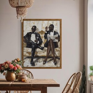 May include: A framed artwork depicts two figures in formal attire, seated on a bench. One holds a newspaper with the text "The American". The painting is in a room with a wooden table, chairs, and a chandelier.