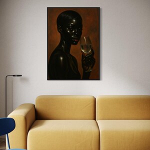 May include: A framed portrait of a person with dark skin holding a glass of white wine. The person is depicted with short hair and red lipstick. The background is a warm, reddish-brown color. The portrait hangs above a yellow sofa.
