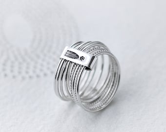 10 Stack of Twist and Turn Silver rings