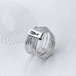 10 Stack of Twist and Turn Silver rings image 1