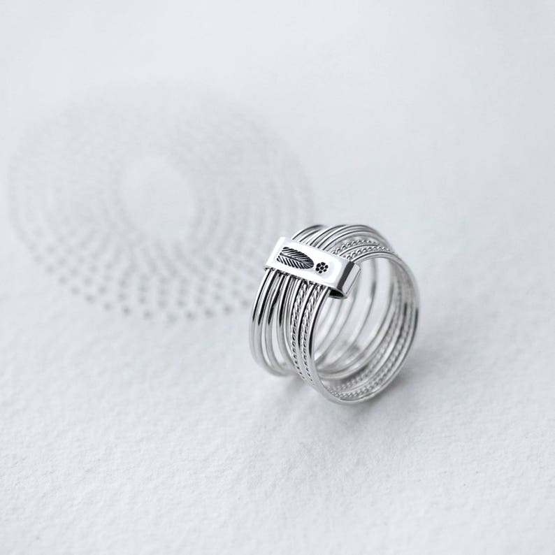 10 Stack of Twist and Turn Silver rings image 1