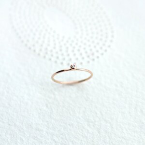 Tiny Diamond Solitaire 18kt Gold ring image 6