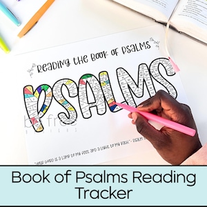 May include: A white paper with the words "Reading the Book of PSALMS" and "PSALMS" in large, colorful letters. A hand is holding a pink marker, coloring in the letter "S". The text "Book of Psalms Reading Tracker" is at the bottom.