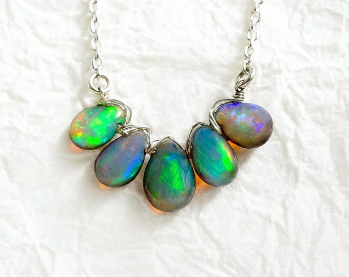 Featured listing image: Vibrant Ethiopian Opal Pendant with Black Urushi Backing, Silver Wire Wrapped Necklace