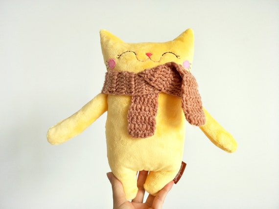 yellow cat stuffed animal
