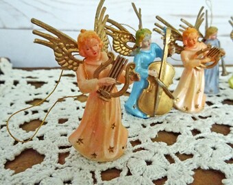 vintage Christmas - 9 plastic angels playing instruments with hangers