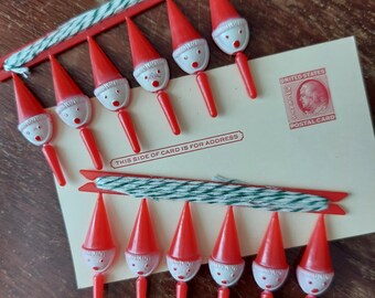 2 x vintage Santa Christmas card clips