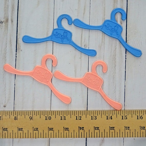 plastic doll clothes hangers