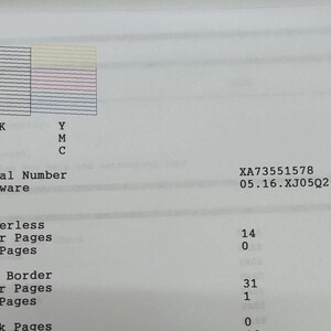 May include: Printed document with colour and black ink test patterns. Includes text labels: BK, Y, M, C, Serial Number, Firmware, Borderless, With Border, Color Pages, B/W Pages, and Blank Pages. The serial number is XA73551578.
