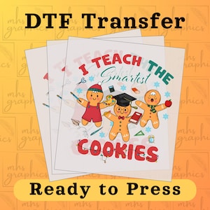 May include: DTF transfer sheets with a colorful design featuring gingerbread characters in a classroom setting. The text reads "I TEACH THE Smartest COOKIES" and "Ready to Press". The image is on a yellow background.