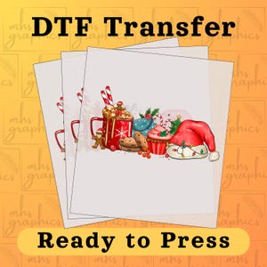 May include: DTF Transfer sheets with a festive Christmas design. The design includes a red mug with marshmallows, cookies, a Santa hat, and a cupcake. The text "Ready to Press" is displayed at the bottom.