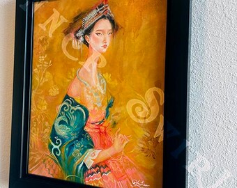 May include: A framed painting of a woman in a traditional Asian dress with a crown on her head. The woman is sitting and holding a needle in her hand. The background is a yellow and gold color with floral designs.